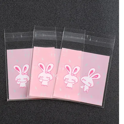 Lot de 10 sachets cadeaux en plastique - petits lapins